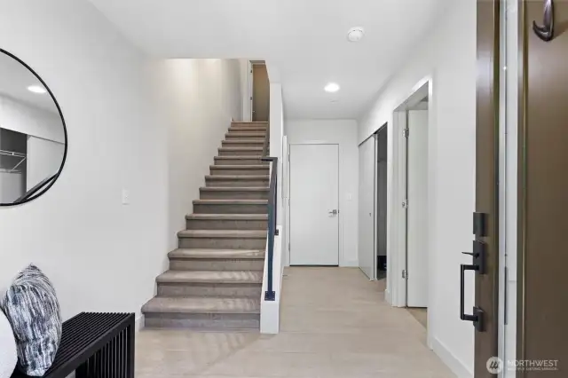 View of entry foyer from front door.