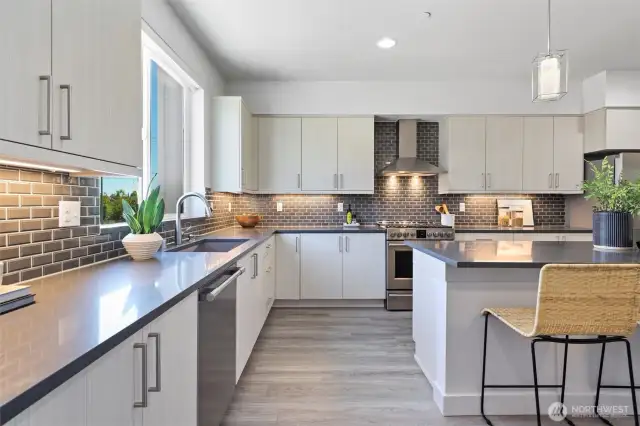Sleek, modern kitchen is light and bright.