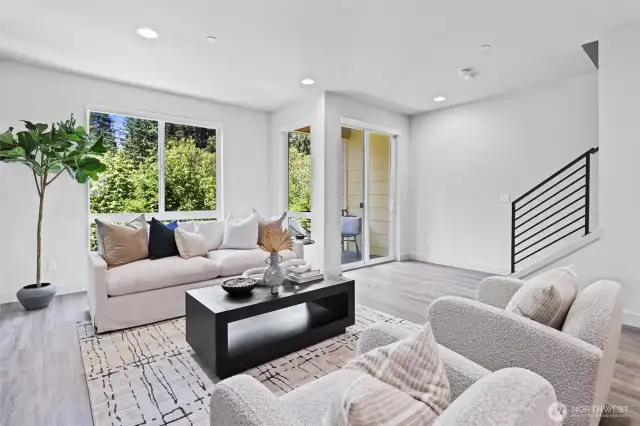 Main floor windows have remote-controlled automatic window shades that roll up to the very top of the windows to let in maximum natural light.