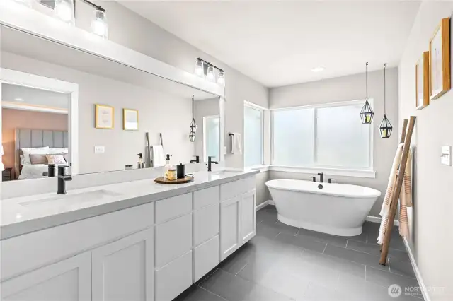 Primary suite 5 peice bath, water closet, larger upgraded walk in shower and stand-alone soaking tub