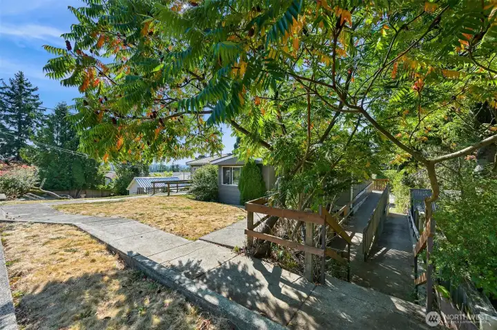 Front of house with walkway to the back from 23rd St