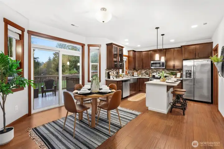 Kitchen and dining nook flow seamlessly into each other.