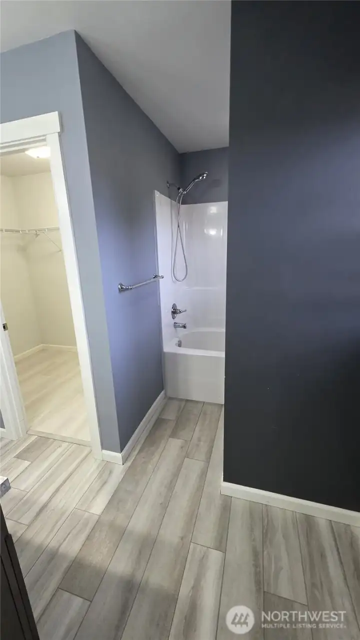 Master Bedroom shower and toilet behind the wall