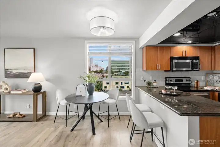 Open Kitchen and eating space. Views of the city skyline!
