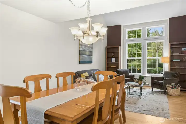 Dining Room with room to expand when there are guests coming. Note staircase to left goes to lower level Dining Room with room to expand when there are guests coming. Note staircase to left goes to lower level