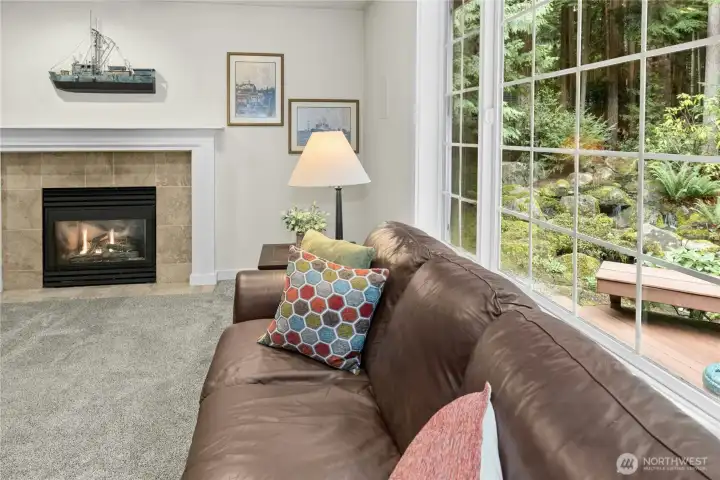 Enjoy views of the natural waterfall pond, hot tub deck and natural woodland back yard Enjoy views of the natural waterfall pond, hot tub deck and natural woodland back yard