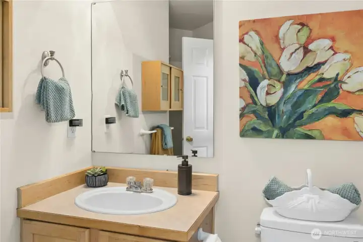 Main floor 3/4 bathroom with walk in shower and newer high rise toilet Main floor 3/4 bathroom with walk in shower and newer high rise toilet