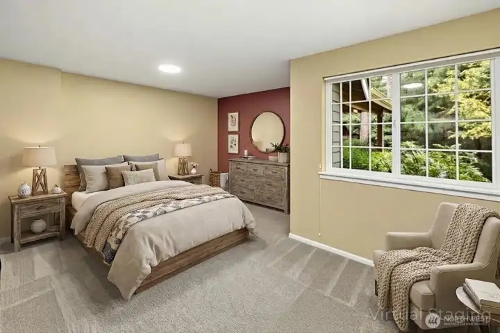 Main floor media room virtually staged as a bedroom...just down the hall from the 3/4 main floor bathroom (with shower)