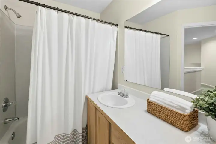 Hallway bathroom with double sinks Hallway bathroom with double sinks