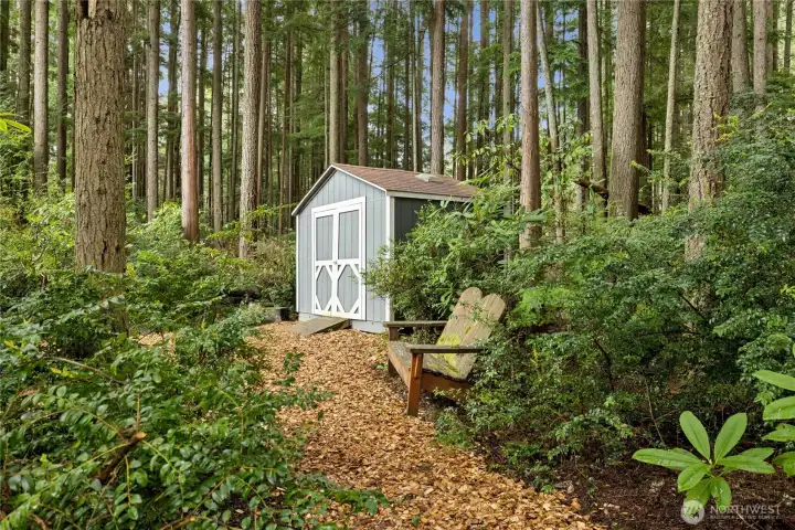 Garden storage shed and woodland trails int he back yard Garden storage shed and woodland trails int he back yard