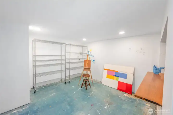 Off the rec room is a room that is ideal for crafts/hobbies or gear storage.