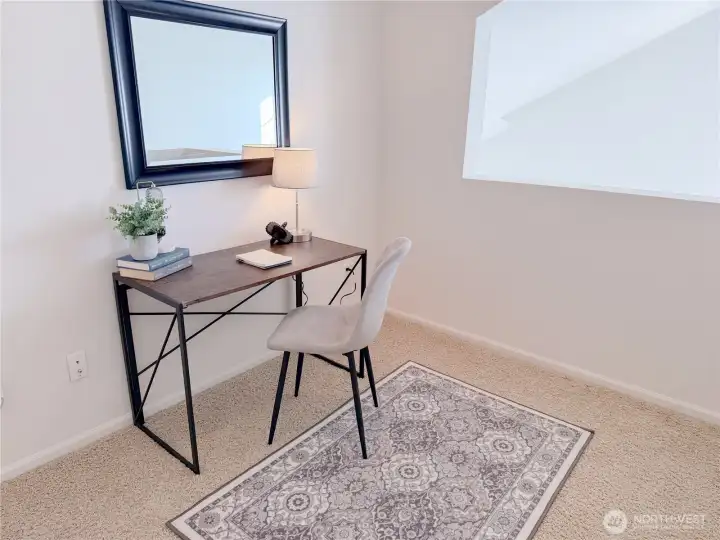 Upstairs loft area make a great office, but could also be a play area or reading nook