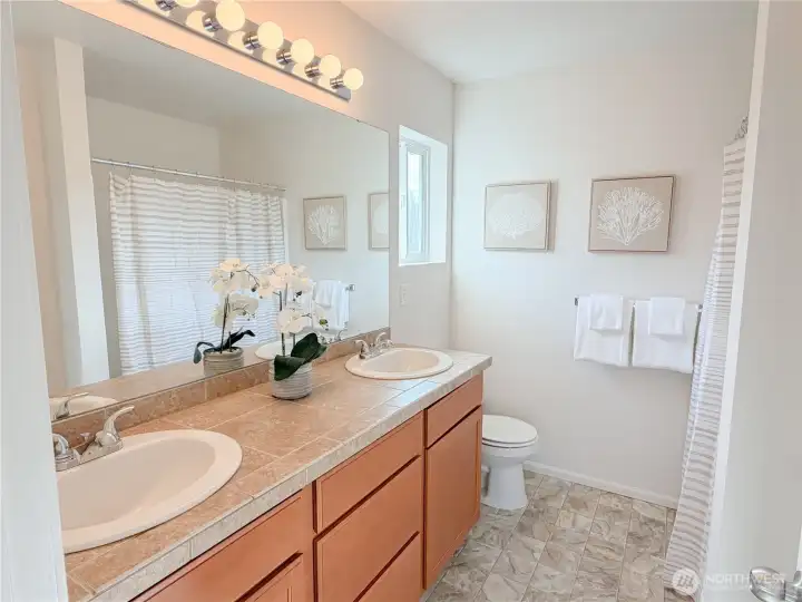 The primary bathroom has two sinks