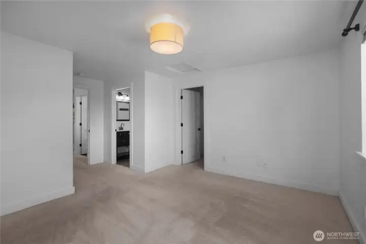 Primary Suite features full bath and walk-in closet