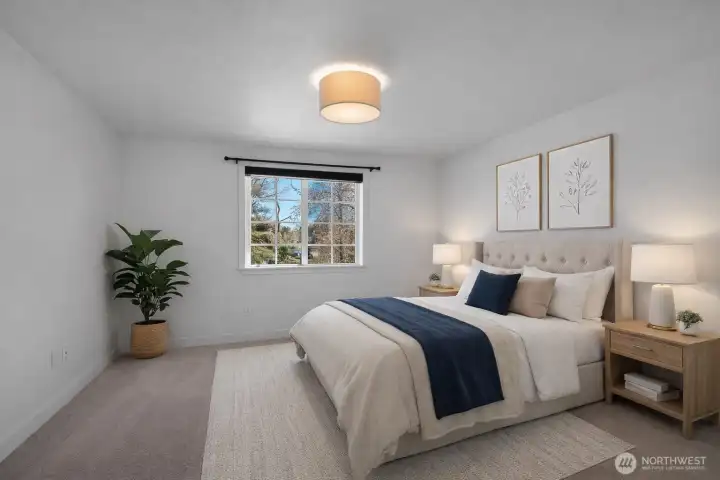 Virtually staged primary suite. Light and airy space!