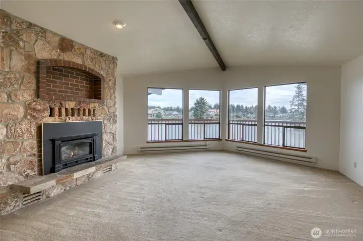 This would be your view from the living area and deck! The living room also includes this warm and inviting propane fireplace perfect for coastal evenings! This would be your view from the living area and deck! The living room also includes this warm and inviting propane fireplace perfect for coastal evenings!