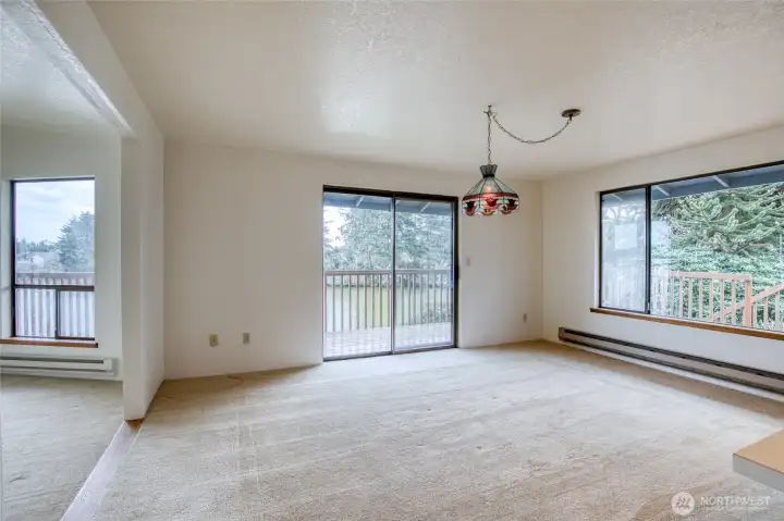 Inside the dining room, use the sliding doors to go out the full length deck! Inside the dining room, use the sliding doors to go out the full length deck!