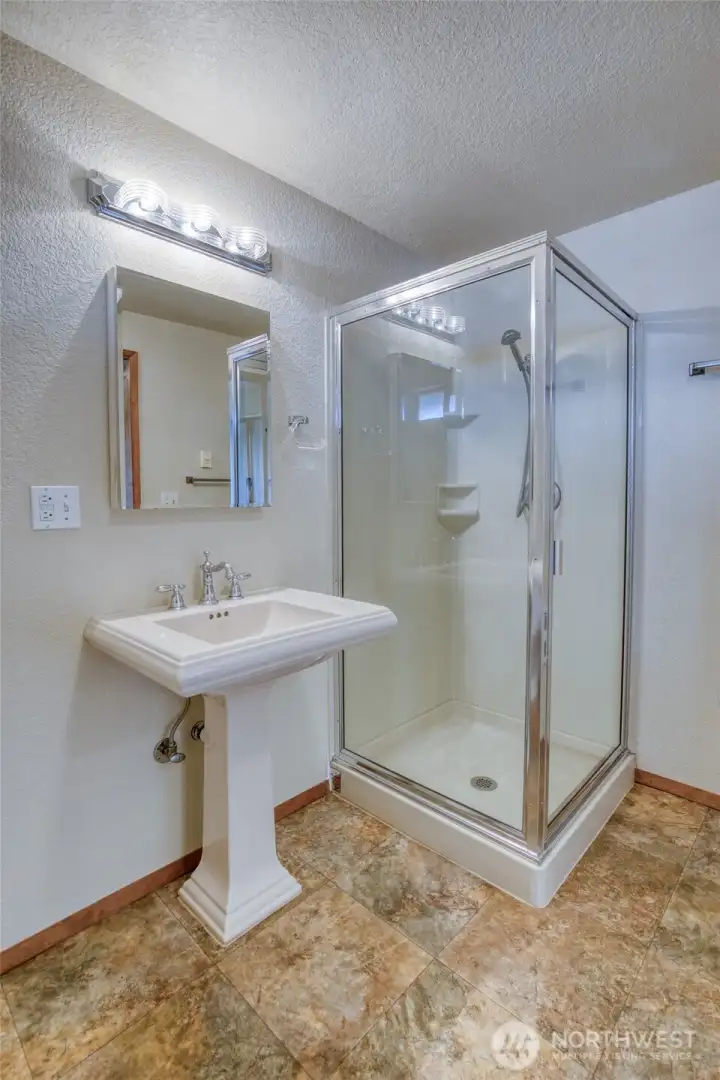 There is also a bath with shower, or mud room just off the kitchen and garage! There is also a bath with shower, or mud room just off the kitchen and garage!