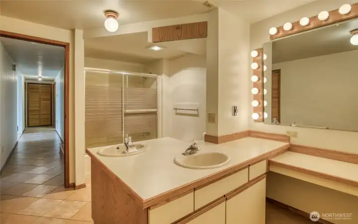 Around the corner is the visitor's downstairs bathroom with classic-height counters! Down the hallway is a large storage closet! Around the corner is the visitor's downstairs bathroom with classic-height counters! Down the hallway is a large storage closet!