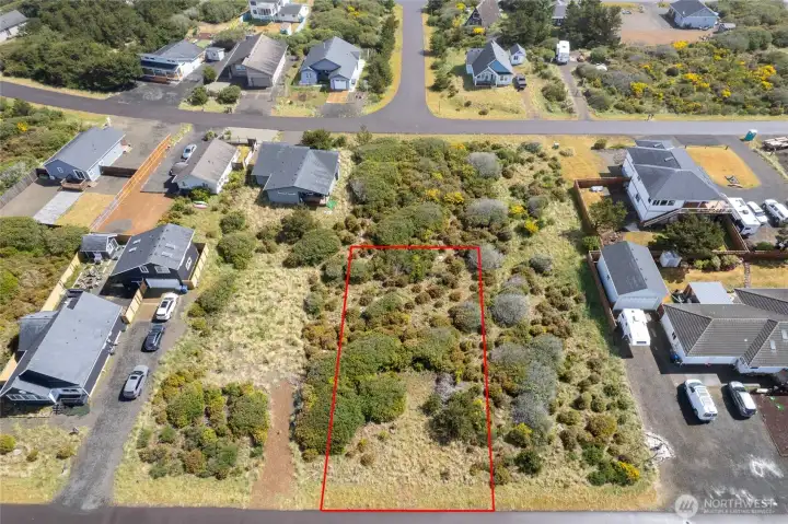 This 7,608-square-foot homesite offers an excellent opportunity to build in one of Ocean Shores' most desirable coastal locations near the north jetty. The level parcel provides ample space for a custom beach home, outdoor living areas, and additional parking, while the peaceful natural surroundings create a private and relaxing atmosphere. Enjoy the convenience of nearby utilities and easy access to the beach, making this an ideal setting for your future coastal retreat.