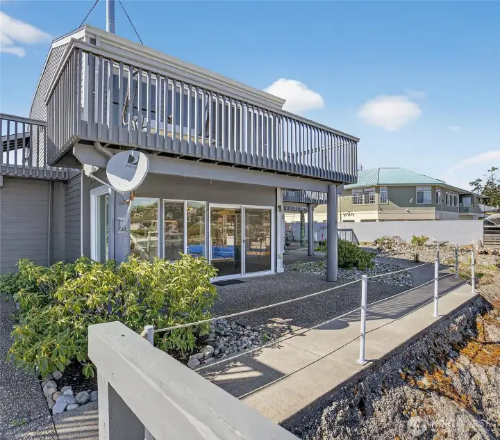 The back patio is perfect for barbeques and lazy days watching the world go by... The back patio is perfect for barbeques and lazy days watching the world go by...