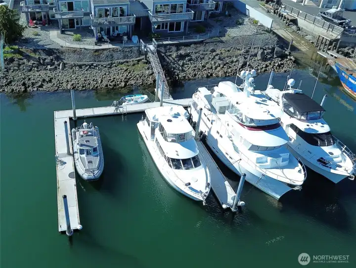 Overhead view of the Dock - the very desirable outer boat slip is on the left and located roughly adjacent to the smaller boat shown in this picture Overhead view of the Dock - the very desirable outer boat slip is on the left and located roughly adjacent to the smaller boat shown in this picture