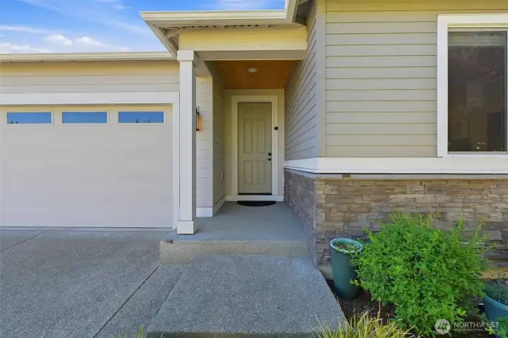 Step inside! This beautiful entryway is just the beginning of the comfort, style, and high-end upgrades waiting for you.