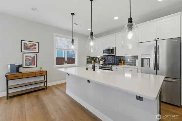 Modern style meets daily functionality. Enjoy an abundance of counter space, a large pantry, and an open layout that keeps you part of the action.