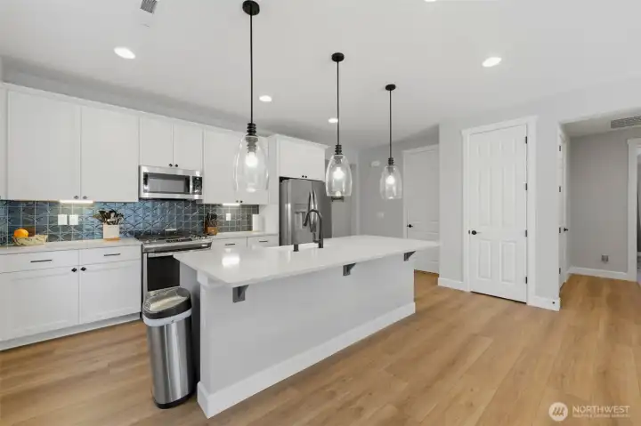 Look at that layout. Every corner of this kitchen is optimized for convenience, style, and easy one-level living.