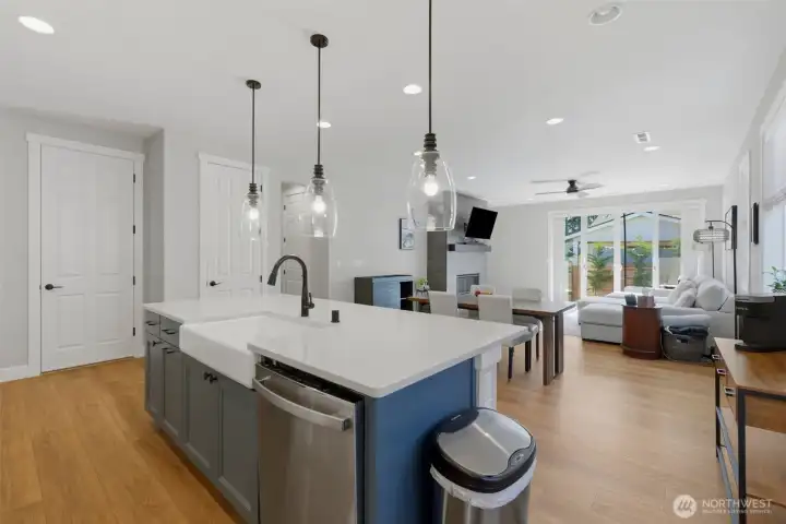 Form meets function. This massive quartz island is the ultimate prep station, complete with an undermount farm sink and plenty of seating space.