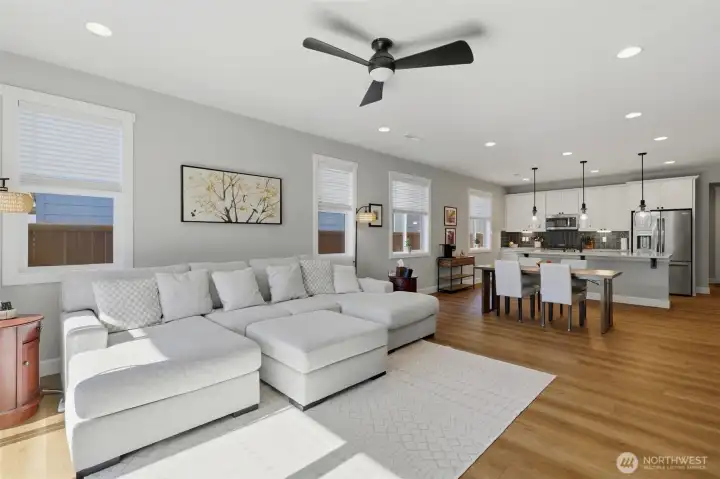 Never miss a moment. Whether you're hosting a game night in the living room or prepping snacks at the island, this bright and cohesive layout keeps everyone together.