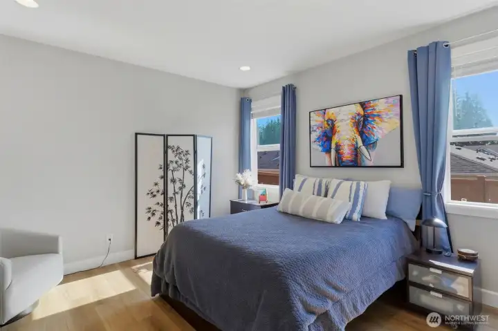Comfort meets style in the primary bedroom. This bright, relaxing space is the perfect layout for a large bed and your favorite bedroom furniture.