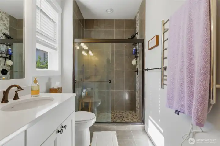 Start your day in style. Love the look of this immaculate, spacious walk-in shower!