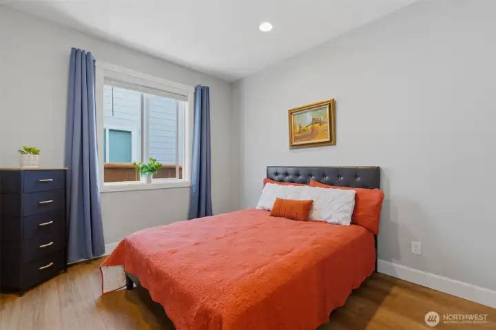 Plenty of room to stretch out. This generous second bedroom features great natural light and a welcoming atmosphere that matches the rest of the home.