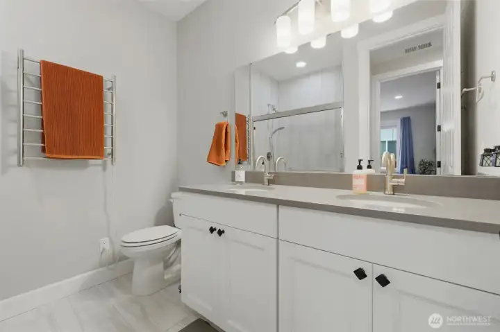 Bright and functional. Plenty of storage and counter space make this modern vanity as practical as it is stylish.