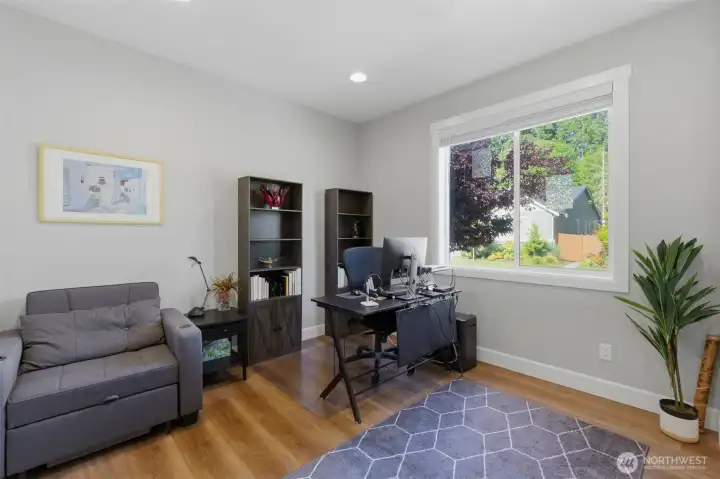 This comfortable, well-sized room offers endless possibilities—perfect for guests, a gym, or a media room.