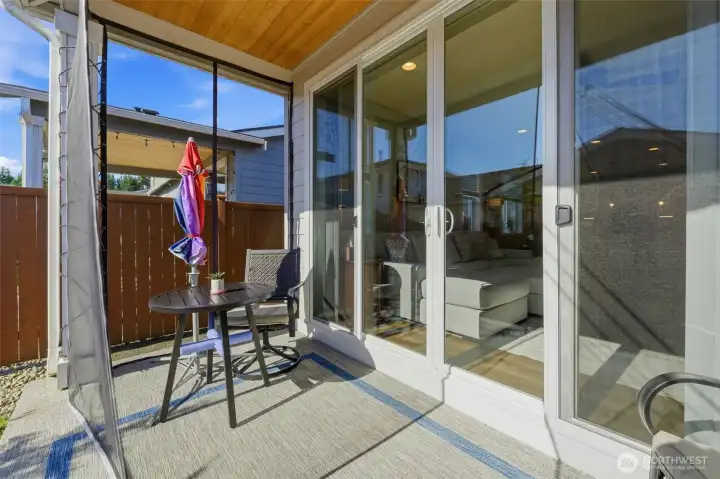True Pacific Northwest living. This seamless transition from the main living area to the covered patio makes it effortless to grill, entertain, or just relax in the fresh air.