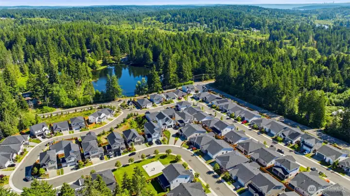 Welcome to the desirable Ridgeline community. From above, you can see how this immaculate home sits perfectly positioned for easy one-level living, close to nearby forest trails, lakes, and easy commuting routes.