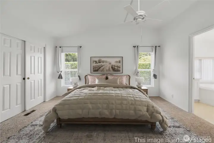 Large Primary bedroom with vaulted ceiling and private ensuite