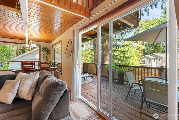 Sliding glass door to deck for an open indoor-outdoor feel