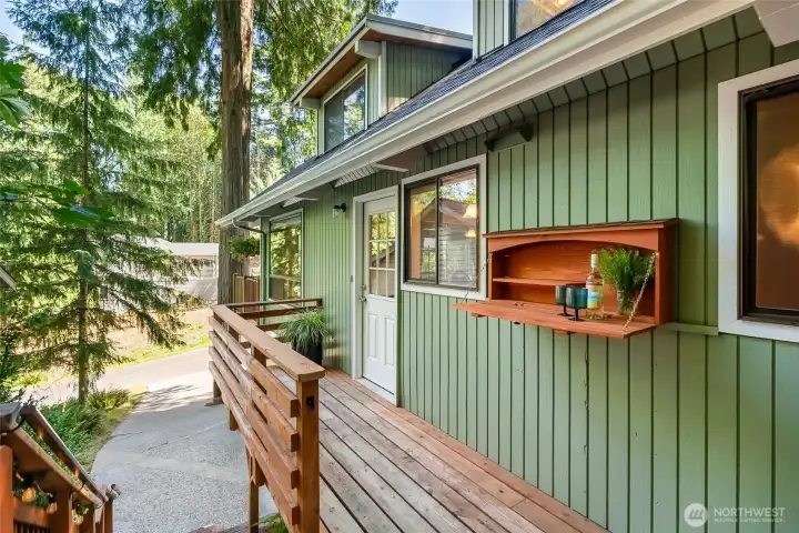 Side deck with entrance to kitchen