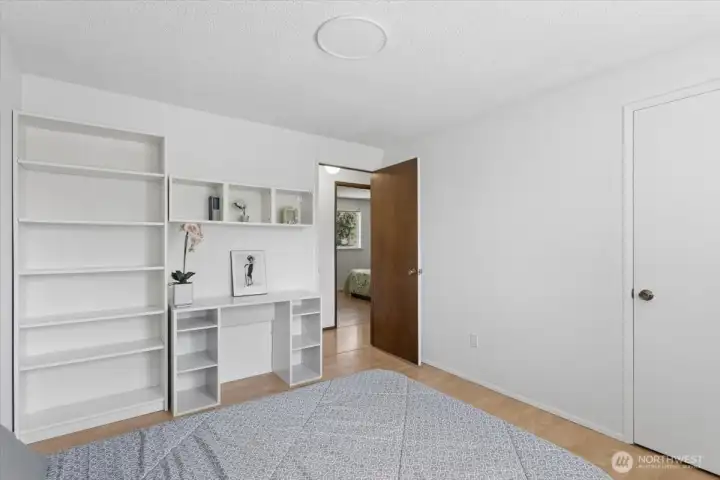 Bedroom with built in shelves (desk can stay) Bedroom with built in shelves (desk can stay)