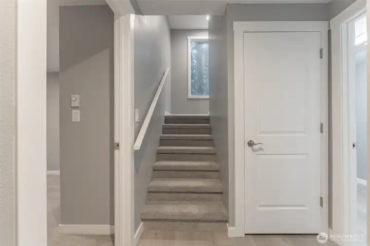 Lower Floor Stairway, utility closet off Laundry Room Lower Floor Stairway, utility closet off Laundry Room