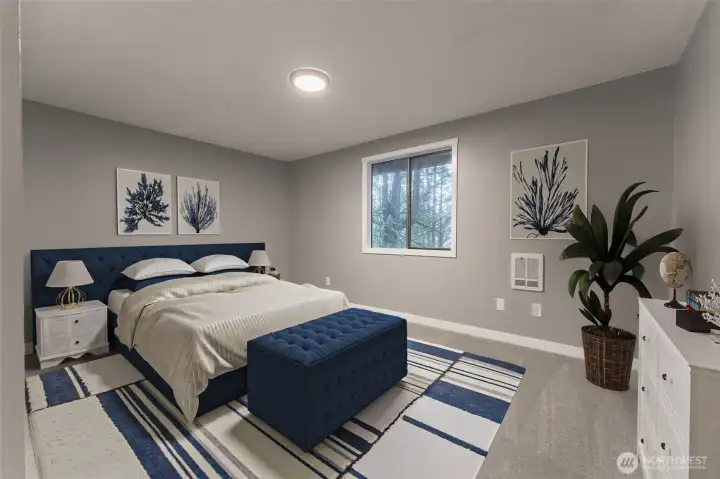 Virtually Staged Bedroom #3 (Primary) on Lower Level Virtually Staged Bedroom #3 (Primary) on Lower Level