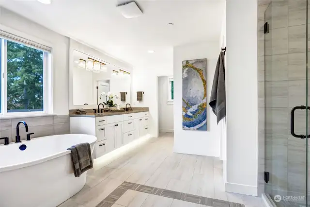 Luxury awaits you in this spa like designer primary bathroom!