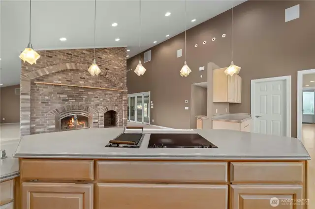 Main Floor Kitchen looking to Fireplace and Family Room