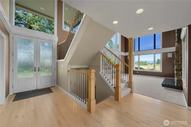 Foyer w/ Living Room to the Right; nearby Dining room and MAIN LEVEL Jr. Suite nearby
