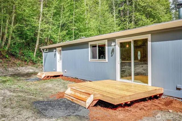 Back of home with decks