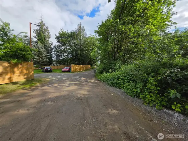 The dirt road leading up to where the property lies beyond