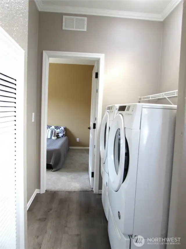 WASHER/DRYER ACROSS FROM BATHROOM.